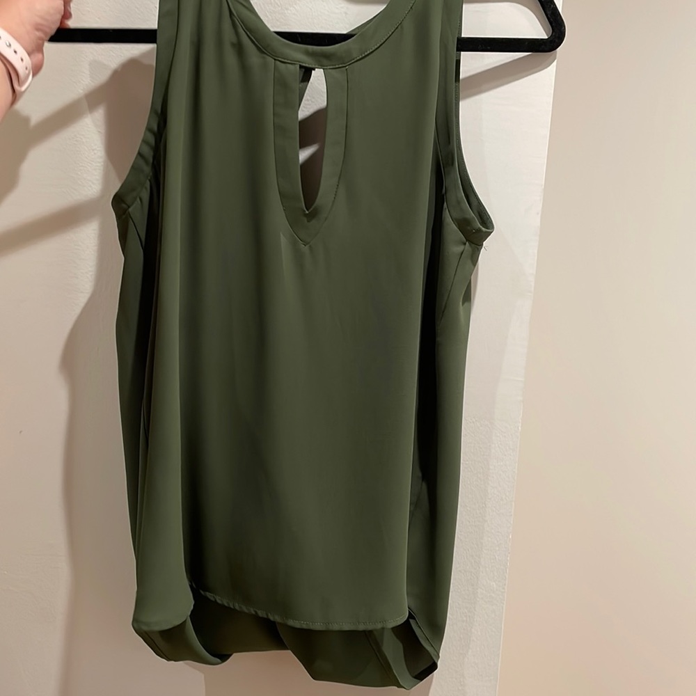Green peak a boo blouse with open back